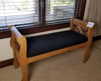 #162~($150) Solid pine wood bench with optional black cushion.  Great condition! Wrought iron leaf scroll accents.  Measures 48"W x 19"D x 19"seat height. 