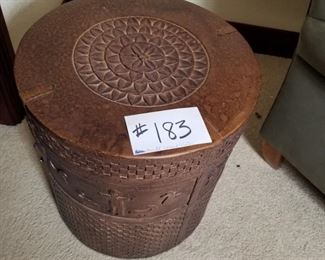 #183 ~($100)  great unique end table! Looks like wood and is very heavy, this is plaster or concrete though.  Made to look like carved wood.  Top does not open, it's just a solid piece.  One side has a surface crack, but can be kept in the back and not seen.  Measures 18"Diam x 20" tall. 