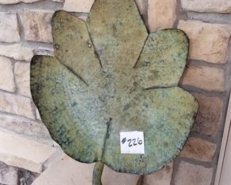 #226 ($35) Large TIN painted palm leaf decor.  Lay on table as a large tray, or hang on the wall.  25"L x 19"W. 