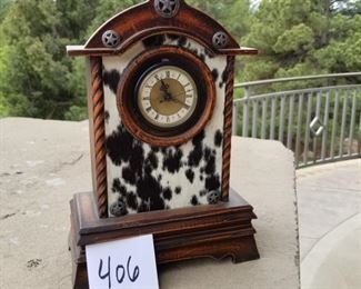 #406 ($50) Great looking cowhide fur mantel clock! Works great! Battery operated.  13.5" tall x 9"W x 4.5"D/