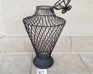 #407 ($25) heavy metal decorative container with attached lid.  Great for greenery!  Or fill with dried floral.  Measures 22" tall x 12" W