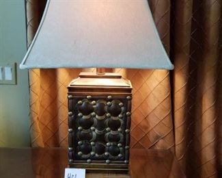 #401 ($15) Leather/metal  lamp.  32" tall. Shows wear- Needs some tightening down.  Works fine