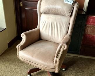 #314- ($20) Beige Leather office chair- Price reflects aesthetic condition- Shows stains and pen marks- otherwise good condition