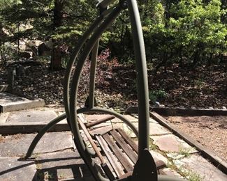 Another view of Iron Garden Swing
Iron is in excellent condition- wood on seat shows wear but can easily be replaced in the future
Measures: 84" wide- 72"depth- 84" height 
-You will need to bring tools and help to load this very heavy iron swing 