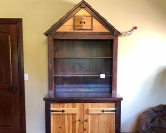 #551 ($150) Two piece  Pine Cabinet with Bookcase- *shows some wear to the wood, see photos for close up* Top measures: 44" W x 11" D x 57" H   - Bottom Measures: 45"W x 25"D x 63"H