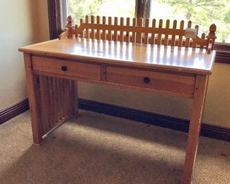 #555- ($50)Desk with little picket fence design - Shows some signs of wear, see close up photo- 48"w x 22"d x 36"H
