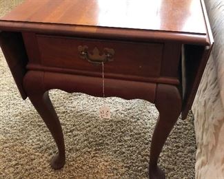 Drop leaf side table. We have a matching set.
