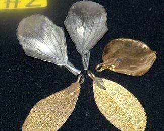 #2 3 Gold Leaf Charms, 2 Silver hair clips.  $12 each Please go to https://tas-estates-sales.com/shop/  to purchase one.