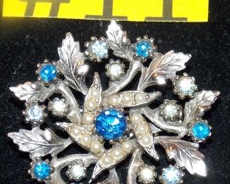 #11 Vintage Brooch all stones intact clasp in good condition $25 1.5x1.5. Go to Tas-Estate-Sales.com to purchase.