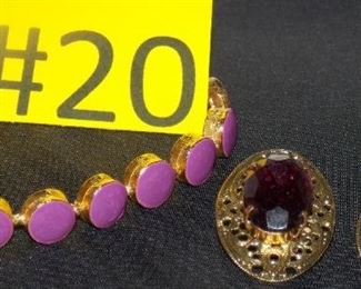 #20 Purple amethyst inspired clip on earrings, purple enamel dot bracelet $5 each. Go to Tas-Estate-Sales.com to purchase.