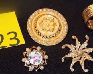 #23 3 Vintage brooch's 1 scarf clip Stones and clasp intact $5 each.  Go to Tas-Estate-Sales.com to purchase.