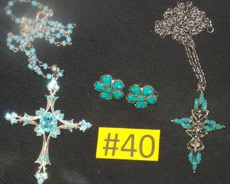 #40 Turquoise inspired necklaces, clip on earrings.  Necklace on left with crystals 11inches, Silver turquoise necklace 13 inches.  $12 each. Go to Tas-Estate-Sales.com to purchase.  CROSS NECKLACE TO THE LEFT IS SOLD