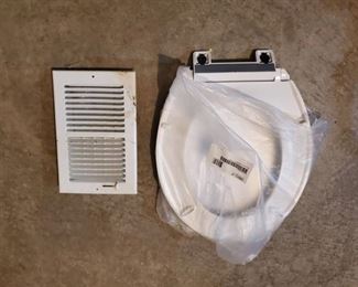 1 Kohler Toilet Seat and 1 Whote Vent