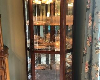 Lighted china cabinet with depression glass collection