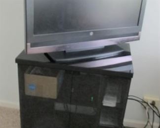 $40.00 tv stand 31 x 27 x 19 and 32" Westinghouse tv $25.00