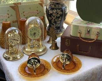 Clocks, sconces, luggage, lamps