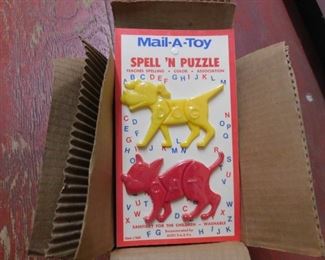 1960's Case/12 of Carded Mail a Toy Spell 'N Puzzle(Sports Games Figures)