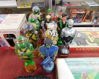 Several Soakies: 1989 Teenage Mutant Ninja Turtles, 1986 G.I. Joe Soakies, 1985 Masters of the Universe Soakies, Robo Cop Soakie
