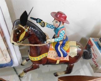 Tin Litho Wind Up Cowboy Riding Horse(Made in Japan)