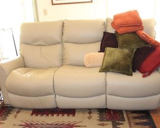 Leather reclining couch in cream