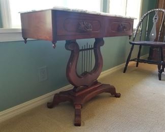 Marble  Top Table with Lyre Base and Two Drawers $175