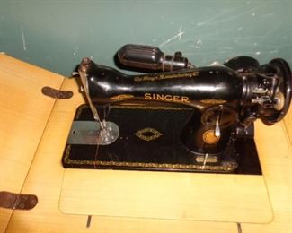 PLL #128  Singer Sewing Machine & Cabinet  $175