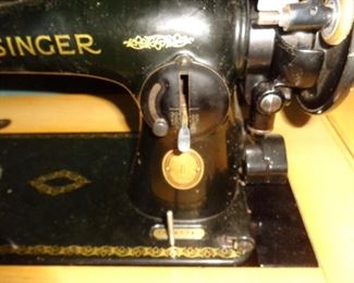 PLL #128Singer Sewing Machine & Cabinet  $175