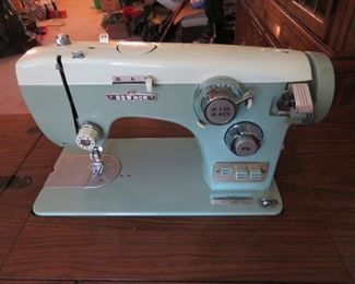 sewmor sewing machine in cabinet