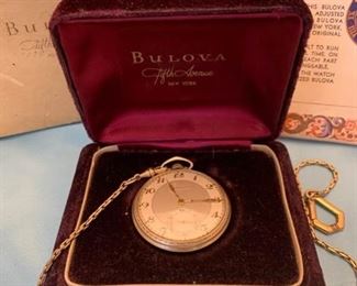 Vintage Bulova Pocket Watch With Original documentation from the Fifth Avenue New York location.  