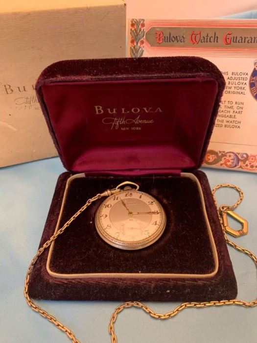 Vintage Bulova Pocket Watch With Original documentation from the Fifth Avenue New York location.  