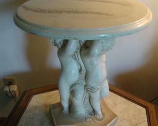 Faux marble top cherub table