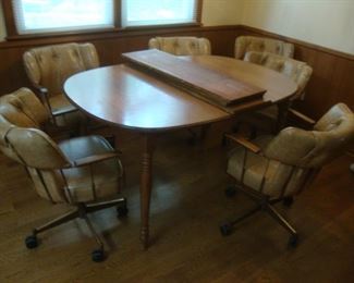 Kitchen table with 3 leaves and 6 chairs