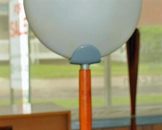 Beautiful 60's table lamp with round glass shade and teak and glass base. $300.00