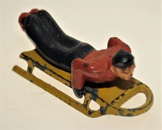 TOY CAST IRON SLEDDER 2 1/2" l x 1" w x 1" h ~ $35.00