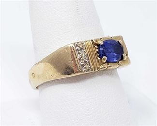 702	

10k Gold Ring With Sapphire And Diamonds, 3.7g
Size 10