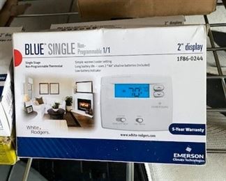 A/C thermostats.  brand new in boxes...over a dozen