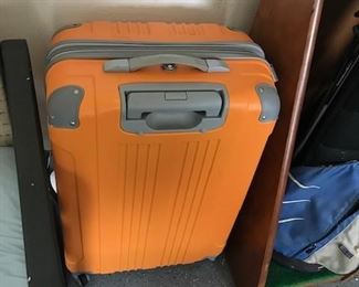 three  case suitcase...new ..used one time