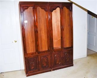 110. Wooden Cabinets with Carved Detail