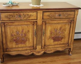 French style paint decorated storage cabinet, 36 1/2”h x x51”w x 22 1/2”d (minor chip on bottom edge -see photo)
Asking: $250
