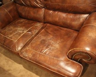 Distressed leather sofa and matching loveseat both haven nailhead trim; sofa - 36 1/2”h x 45”d x 89”l
	loveseat - 36 1/2”h x 45”d x 67”l
Asking: Sofa $350   Loveseat $250
