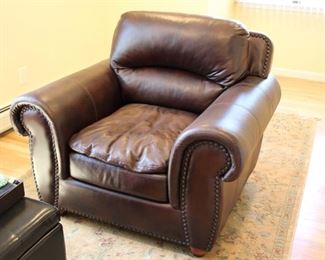 Leather club chair with nail head trim, 38”h x 45”w x 39”d 
Asking: $375
