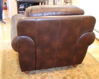 Leather club chair with nail head trim, 38”h x 45”w x 39”d 
Asking: $375
