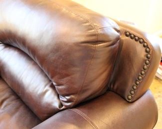 Leather club chair with nail head trim, 38”h x 45”w x 39”d 
Asking: $375
