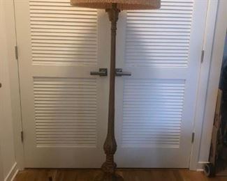 Italian style carved gilt wood floor lamp with fringed pleated silk shade, 3 light, overall 70”h, shade bottom diameter is 22”   $650