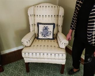 pair of upholstered wingback chairs $400