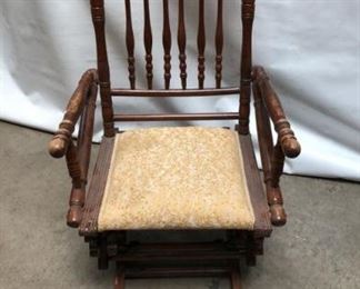 https://connect.invaluable.com/randr/auction-lot/vintage-wood-rocking-chair_50646F0BCF