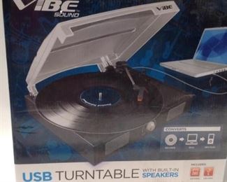 https://connect.invaluable.com/randr/auction-lot/new-sealed-vibe-usb-turntable-w-built-in-speakers_0AF46D58E0