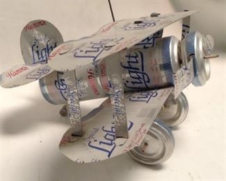 https://connect.invaluable.com/randr/auction-lot/hamms-beer-can-airplane_9234DD1B44