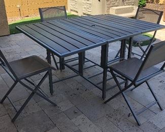 Drop leaf Table, 4 Folding Chairs