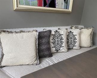 Five black and white pillows on breakfast nook $45 all